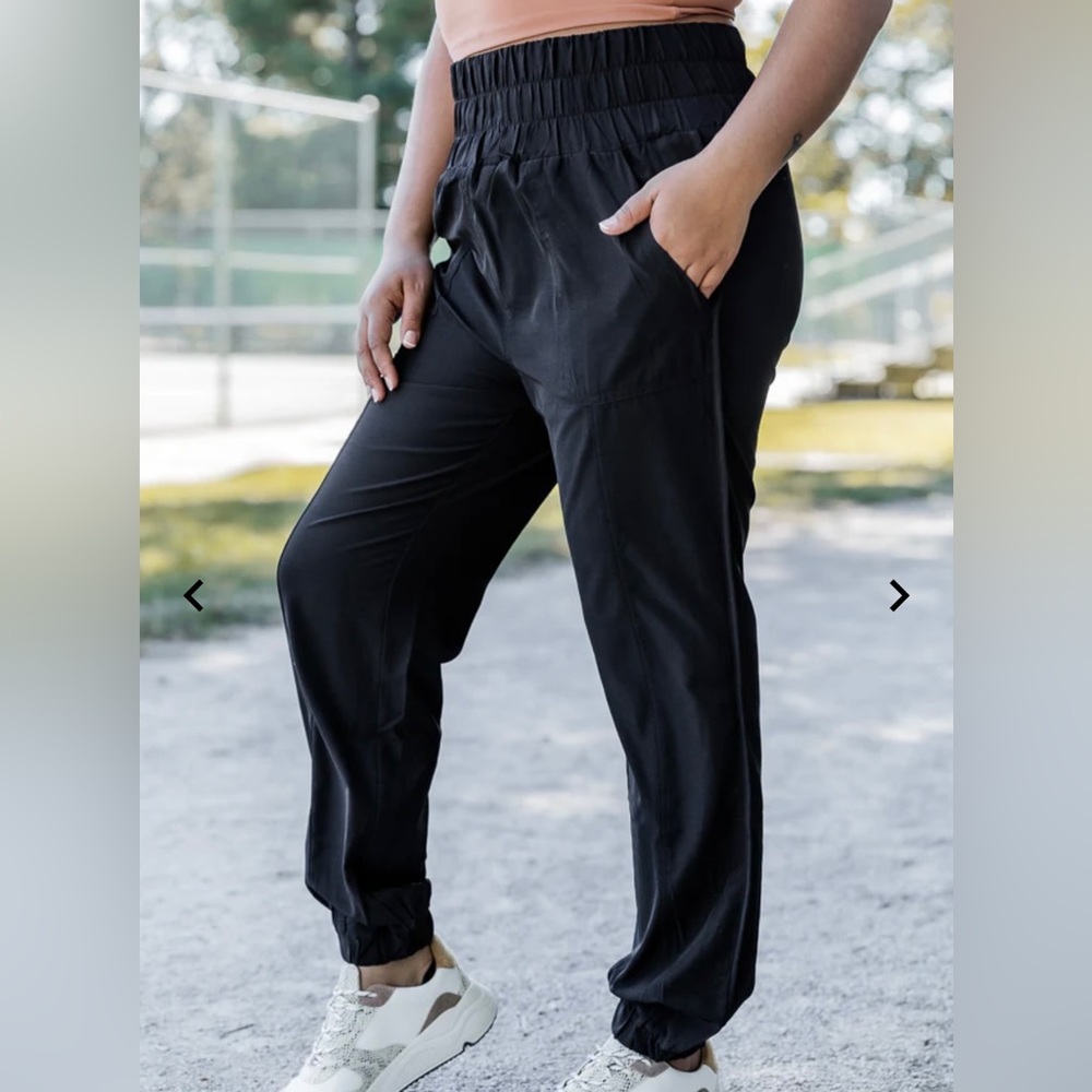 New in black athletic joggers